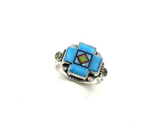 Turquoise Blossom Crown Cross Ring w/Peridot sides.